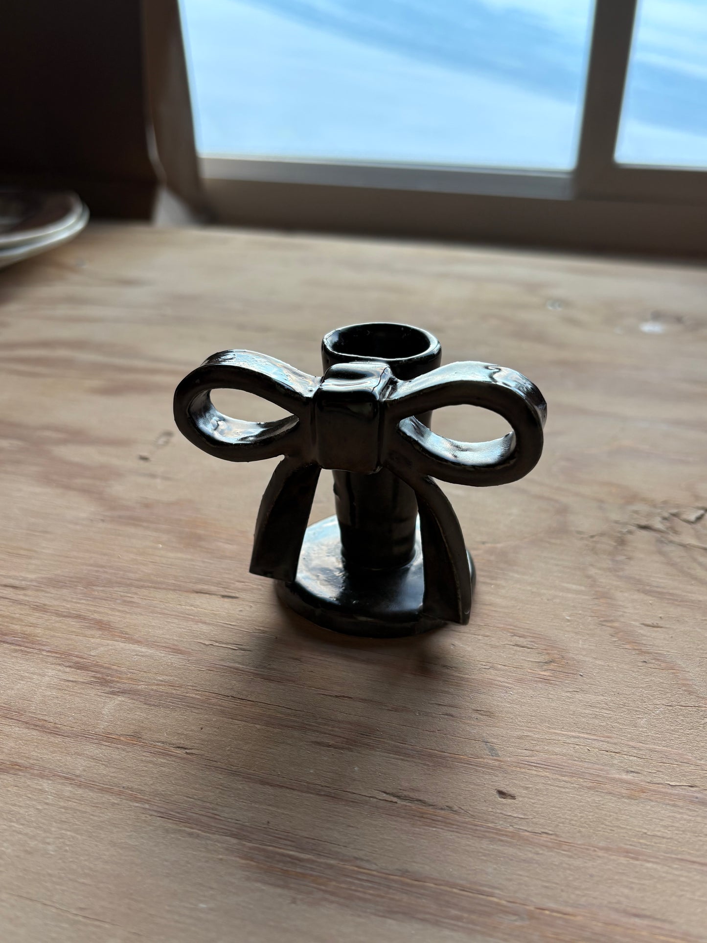 Brown bow candlestick